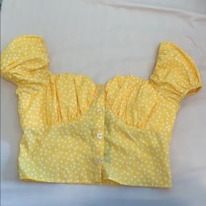 Yellow and white polka dotted top from nasty gal